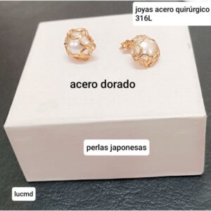 Aros LucMD. Perlas con engarce dorado.